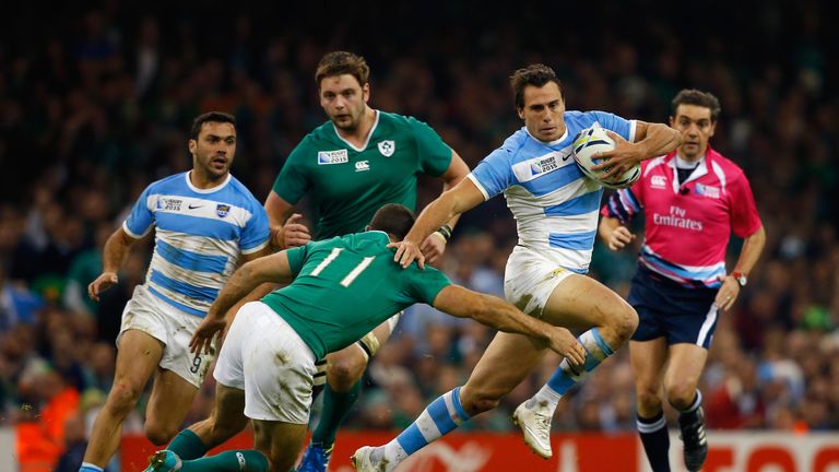 CARDIFF, WALES - OCTOBER 18:  Juan Imhoff of Argentina evades Dave Kearney of Ireland during the 2015 Rugby World Cup Quarter Final match between Ireland a