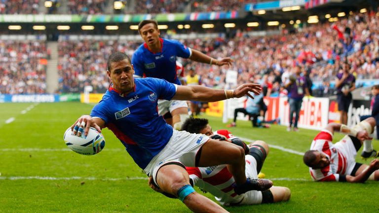 MILTON KEYNES, ENGLAND - OCTOBER 03: Paul Perez of Samoa scores his teams first try during the 2015 Rugby World Cup Pool B match between Samoa and Japan at