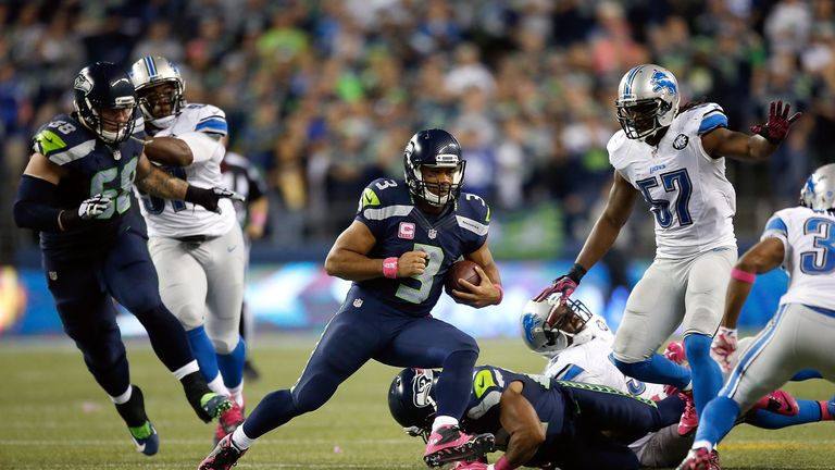 Seattle's Russell Wilson scrambles with the ball during the second half of the 13-10 win over the Detroit Lions