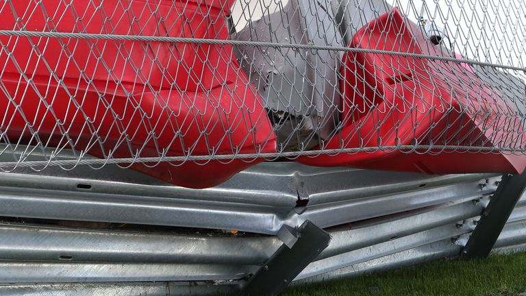 The damaged barriers after Carlos Sainz's crash