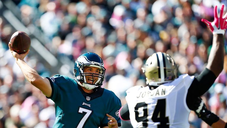 PHILADELPHIA, PA - OCTOBER 11: Quarterback Sam Bradford #7 of the Philadelphia Eagles passes as Cameron Jordan #94 of the New Orleans Saints defends in the