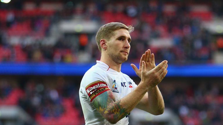 Sam Tomkins of England applauds the supporters