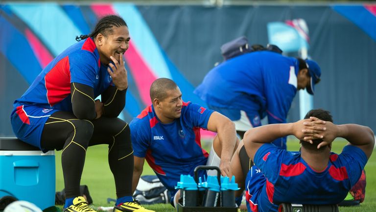 Samoa's wing Alesana Tuilagi (left) chats with team-mates ahead of Japan clash