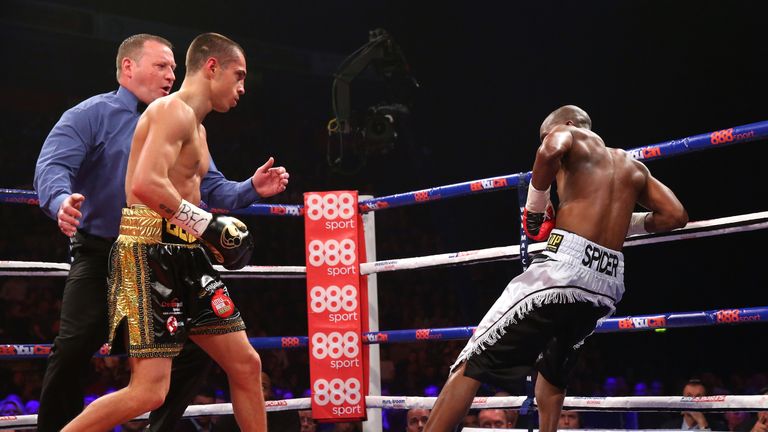 Scott Quigg knocks down Tshifhiwa Munyai for the second time during the WBA World Super Bantamweight Title fight between S