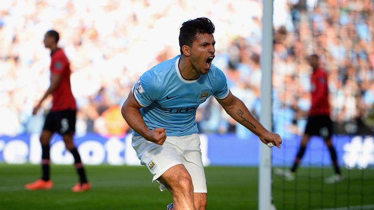 Sergio Aguero of Manchester City (16) celebrates as he scores their first goal in a 4-1 derby win on September 22, 2013