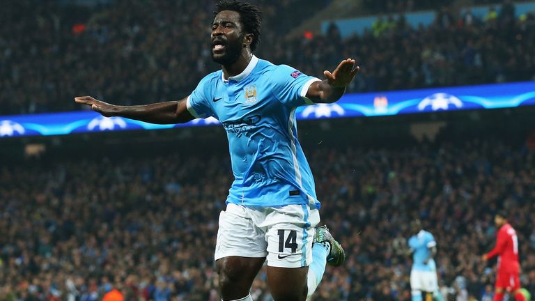 Wilfried Bony of Manchester City celebrates his team's opening goal against Sevilla, an own goal by Adil Rami 