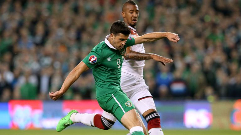 Republic of Ireland's Shane Long (centre) scores their first goal of the game during the UEFA European Championship Qualifying match at the Aviva Stadium, 