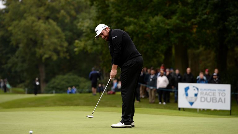 WOBURN, ENGLAND - OCTOBER 10:  Shane Lowry of Ireland putts on the 10th green during the thrid round of the British Masters supported