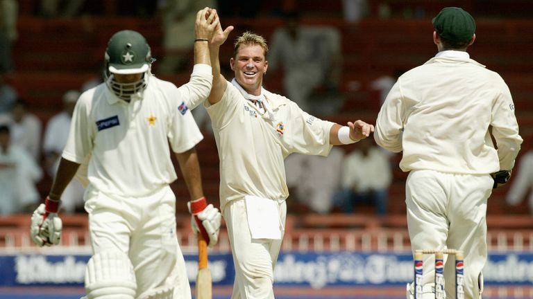 SHARJAH - OCTOBER 11:  Shane Warne of Australia celebrates after trapping Faisal Iqbal of Pakistan LBW for four during day one of the Second Test match bet