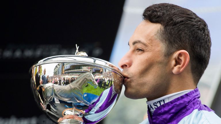 Silvestre De Sousa with the trophy after being crowned as Stobart Champion Flat Jockey