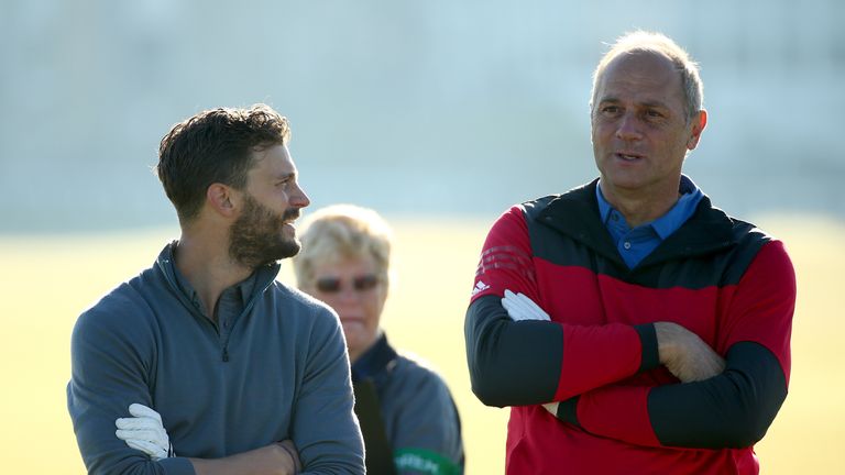 ST ANDREWS, SCOTLAND - OCTOBER 01:  Sir Steve Redgrave talks with Jamie Dornan on the second hole during the first round of the 2015 Alfred Dunhill Links C