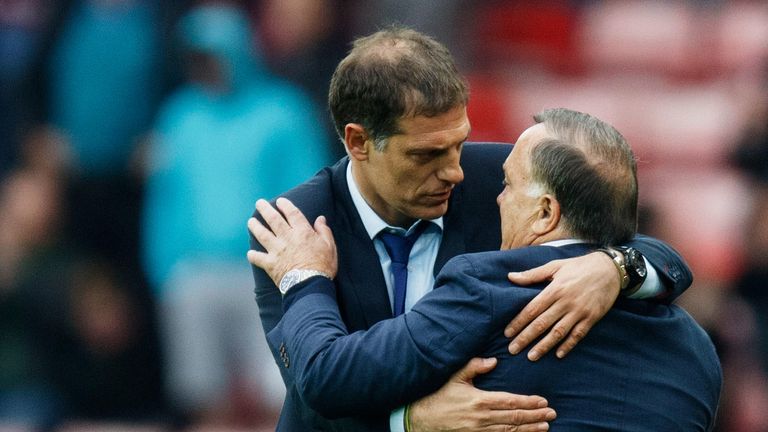 Slaven Bilic embraces Dicok Advocaat at the end of West Ham's 2-2 draw with Sunderland on Wearside
