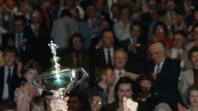 Dennis Taylor with the trophy after beating Steve Davis in the 1985 World Snooker Championship final