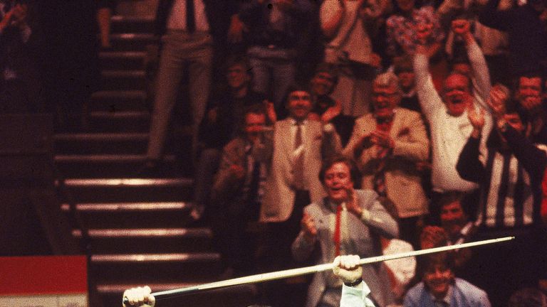 Dennis Taylor celebrates victory in the World Snooker Championship Final at the Crucible Theatre