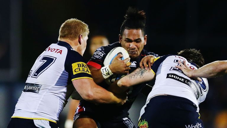 Solomone Kata of the New Zealand Warriors on the charge against NRL opponents  North Queensland Cowboys.