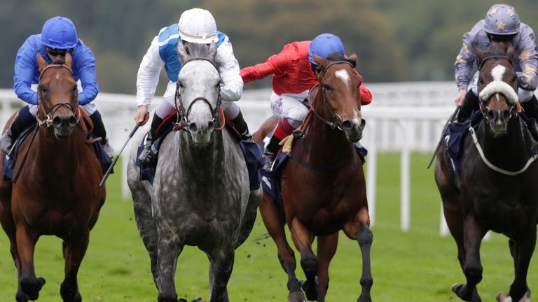 Solow, ridden by Maxime Guyon, leads the field home to win the Queen Elizabeth II Stakes at Ascot