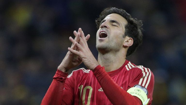 Cesc Fabregas saw his penalty saved on the occasion of his 100th cap for Spain