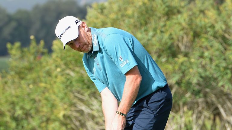 ALBUFEIRA, PORTUGAL - OCTOBER 15: Stephen Gallacher of Scotland putts on the 13th green during the first round of the Portugal Masters at Oceanico Victoria