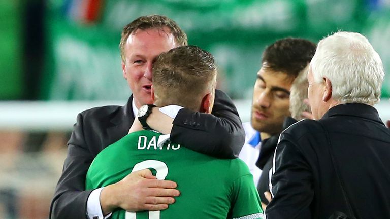Northern Ireland boss Michael O'Neill congratulates Steven Davis after the final whistle of the UEFA European Championship Qualifying match at Windsor Park