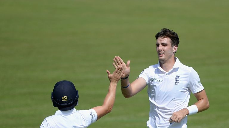 SHARJAH, UNITED ARAB EMIRATES - OCTOBER 08:  Steven Finn of England celebrates with James Taylor after dismissing Ali Asad of Pakistan A during day one of 