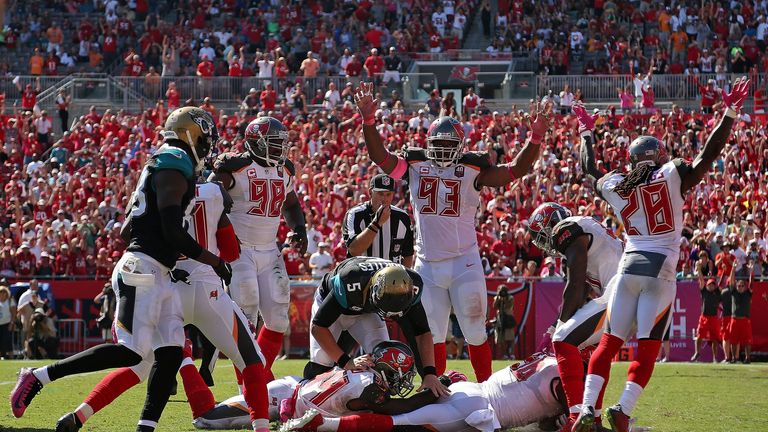  Jacquies Smith #56 of the Tampa Bay Buccaneers scores a touchdown on a fumble during a game against the Jacksonville Jaguars at Ray
