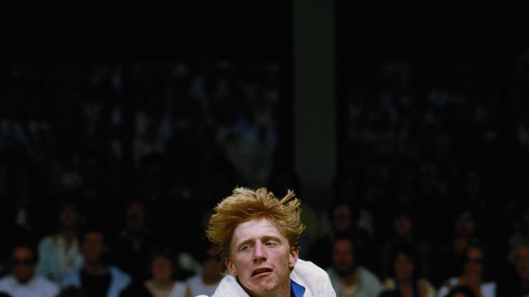 Boris Becker stretches to make a diving backhand return from Anders Jarryd at Wimbledon in 1985