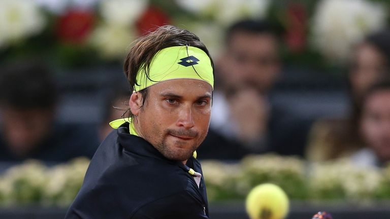 David Ferrer in action against Kei Nishikori in their quarter-final match at the Mutua Madrid Open