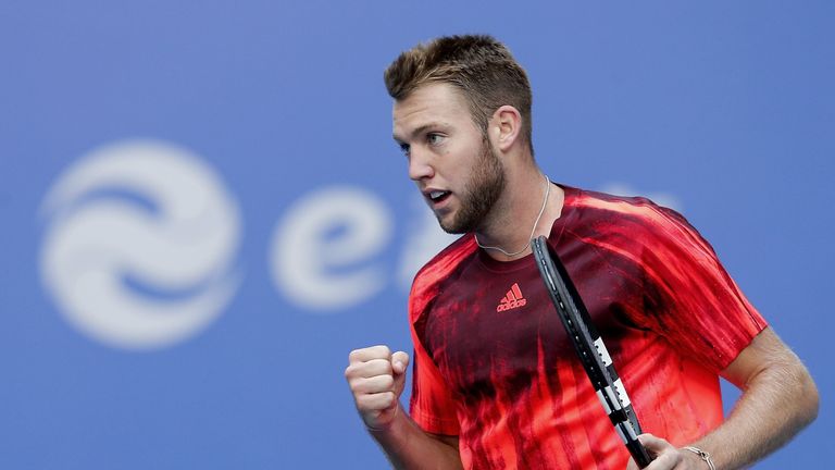 Jack Sock of the United States celebrates a point against Rafael Nadal of Spain at the 2015 China Open