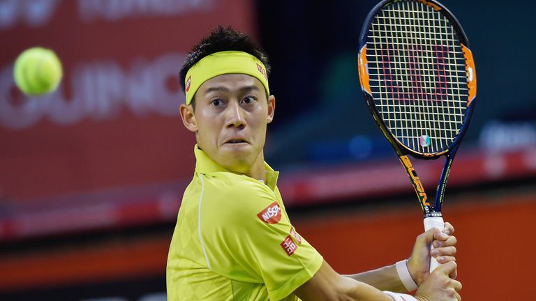 Kei Nishikori competes against Sam Querrey during the second round match at the Japan Open