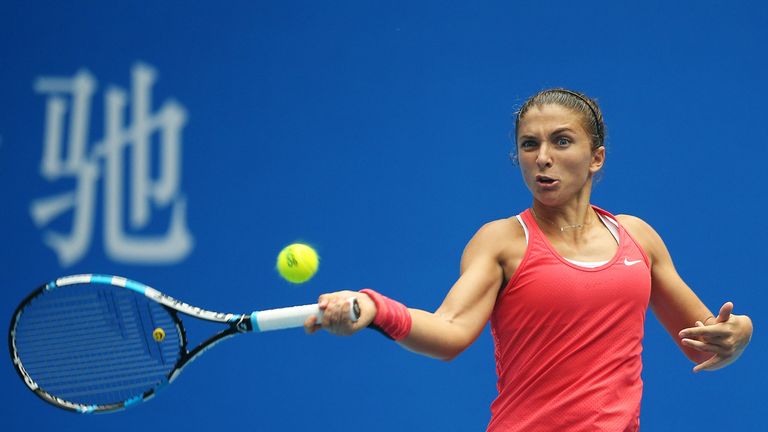 Sara Errani returns a ball against Andrea Petkovic at the 2015 China Open