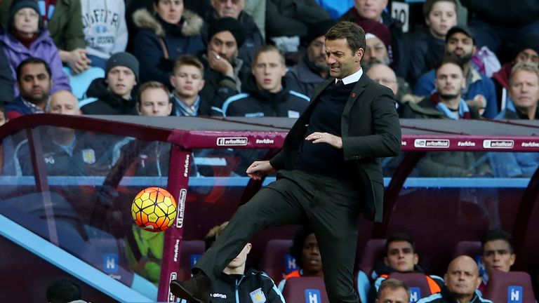 Aston Villa manager Tim Sherwood kicks the ball in frustration