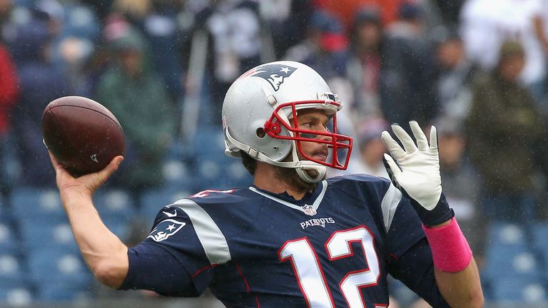 Tom Brady #12 of the New England Patriots warms up before a game against the New York Jets at Gillette Stadium on October 25, 20