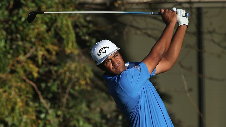 Tony Finau watches his tee shot