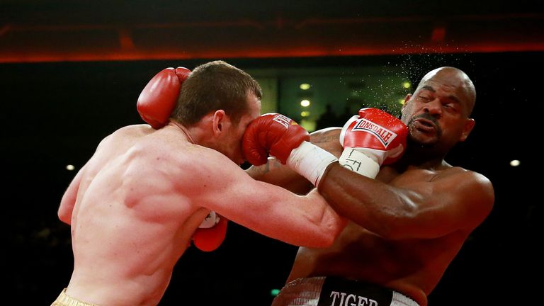 David Price of England (L) in action with Tony Thompson of United States during their International Heavyweight Fight on Jul