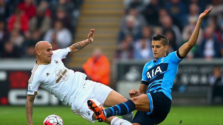 Jonjo Shelvey of Swansea City and Erik Lamela of Tottenham Hotspur  during the Barclays Premier League match between Swansea City and Tottenham Hotspur