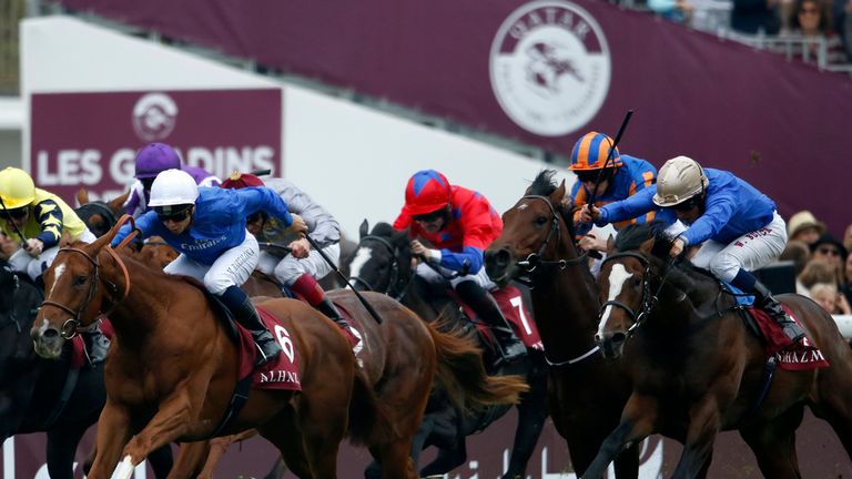 Mickael Barzalona riding Ultra (2L, white cap) win The Qatar Prix Jean-Luc Lagarders at Longchamp