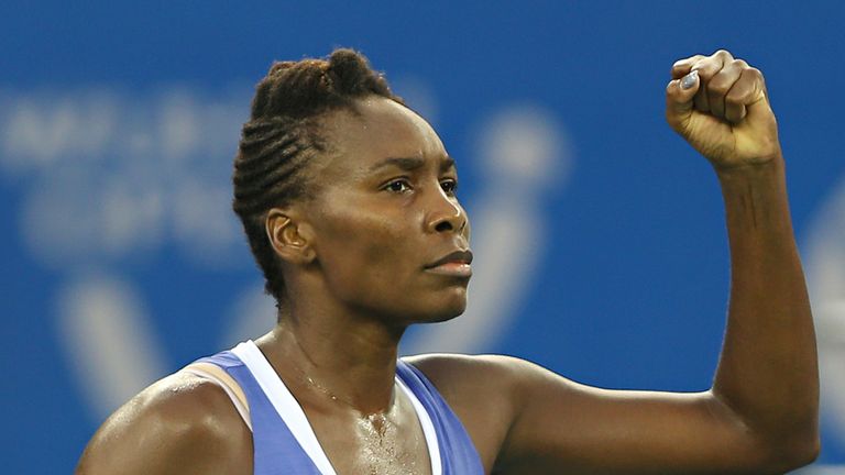 Venus Williams of USA reacts after winning the semifinal match against Roberta Vinci