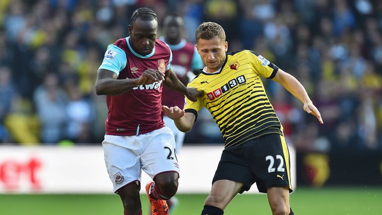 Victor Moses is put under pressure by Almen Abdi 