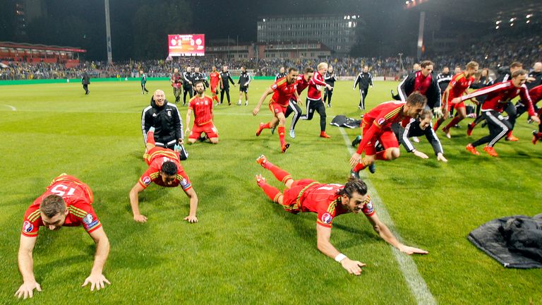 Wales players celebrate qualifying for Euro 2016.