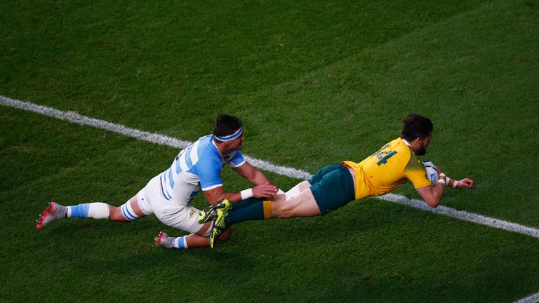 LONDON, ENGLAND - OCTOBER 25:  Adam Ashley-Cooper of Australia goes over to score second first try during the 2015 Rugby World Cup Semi Final match between