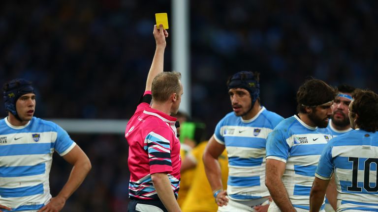 LONDON, ENGLAND - OCTOBER 25:  Tomas Lavanini of Argentina (c no5) is shown a yellow card and sent to sin bin by referee Wayne Barnes of England during the