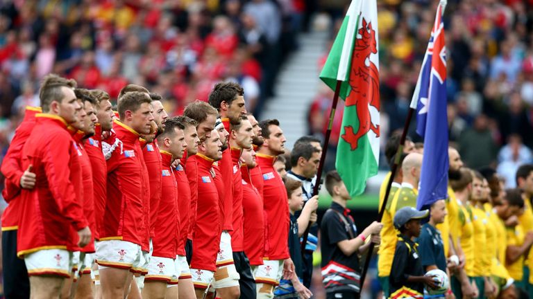 LONDON, ENGLAND - OCTOBER 10: The teams line up for the national anthems prior to the 2015 Rugby World Cup Pool A match between Australia and Wales at Twic