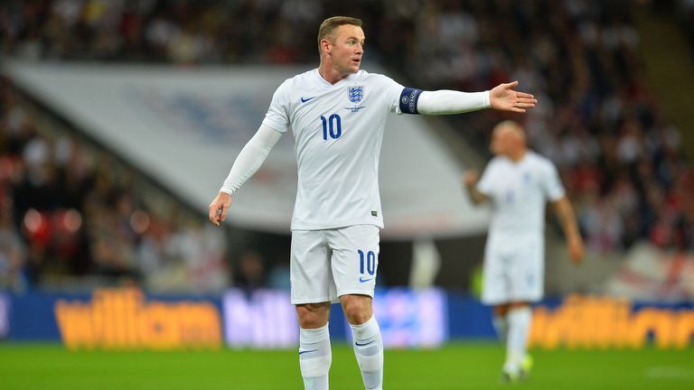 England's striker Wayne Rooney shouts instructions to his team mates during the Euro 2016 qualifying group E football match between England and Switzerland