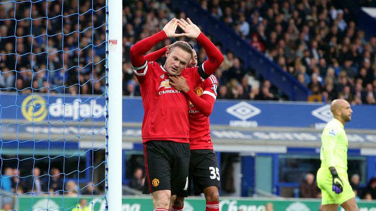 Manchester United's Wayne Rooney celebrates scoring his side's third goal during the Barclays Premier League match at Goodison Park, Liverpool.