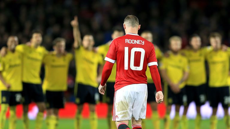 Manchester United's Wayne Rooney dejected after missing his penalty during the shootout following the Capital One Cup, Fourth Round match at Old Trafford, 