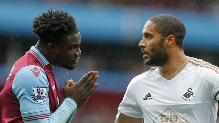 BIRMINGHAM, ENGLAND - OCTOBER 24:  Micah Richards of Aston Villa and Ashley Williams of Swansea City argue during the Barclays Premier League match between