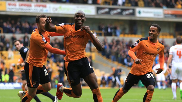 Wolverhampton Wanderers' Benik Afobe (centre) celebrates scoring his side's second goal of the game during the Sky Bet Championship match at Molineux