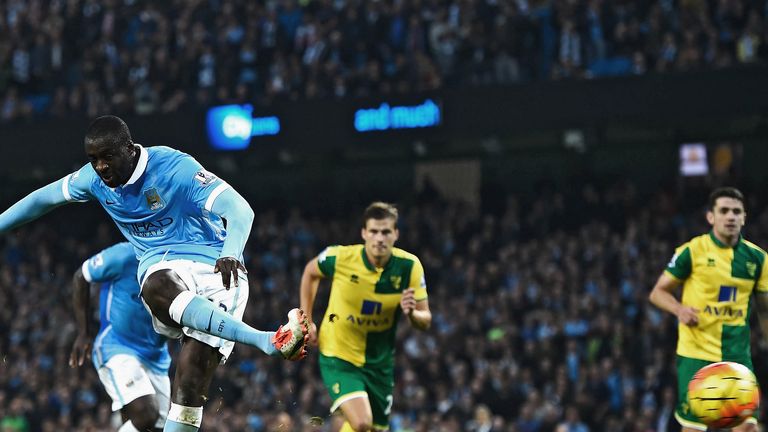 Yaya Toure of Manchester City scores his team's second goal from the penalty spot