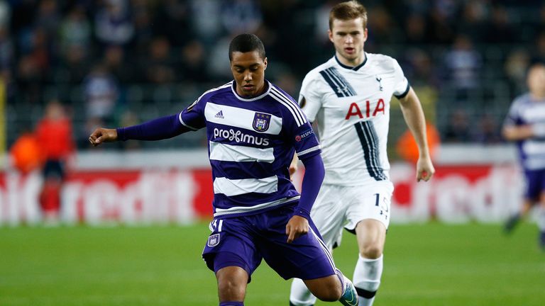 Yoeri Tielemans is chased down by Eric Dier 