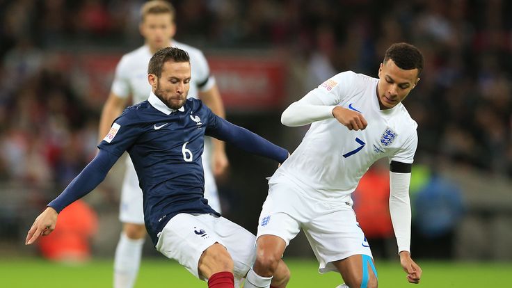 France's Yohan Cabaye (left) and England's Dele Alli battle for the ball during the international friendly match at Wembley Stadium, London. 